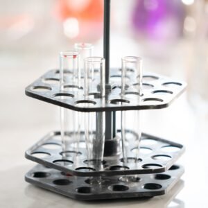 Focused shot of empty test tubes in a lab holder, symbolizing scientific research.